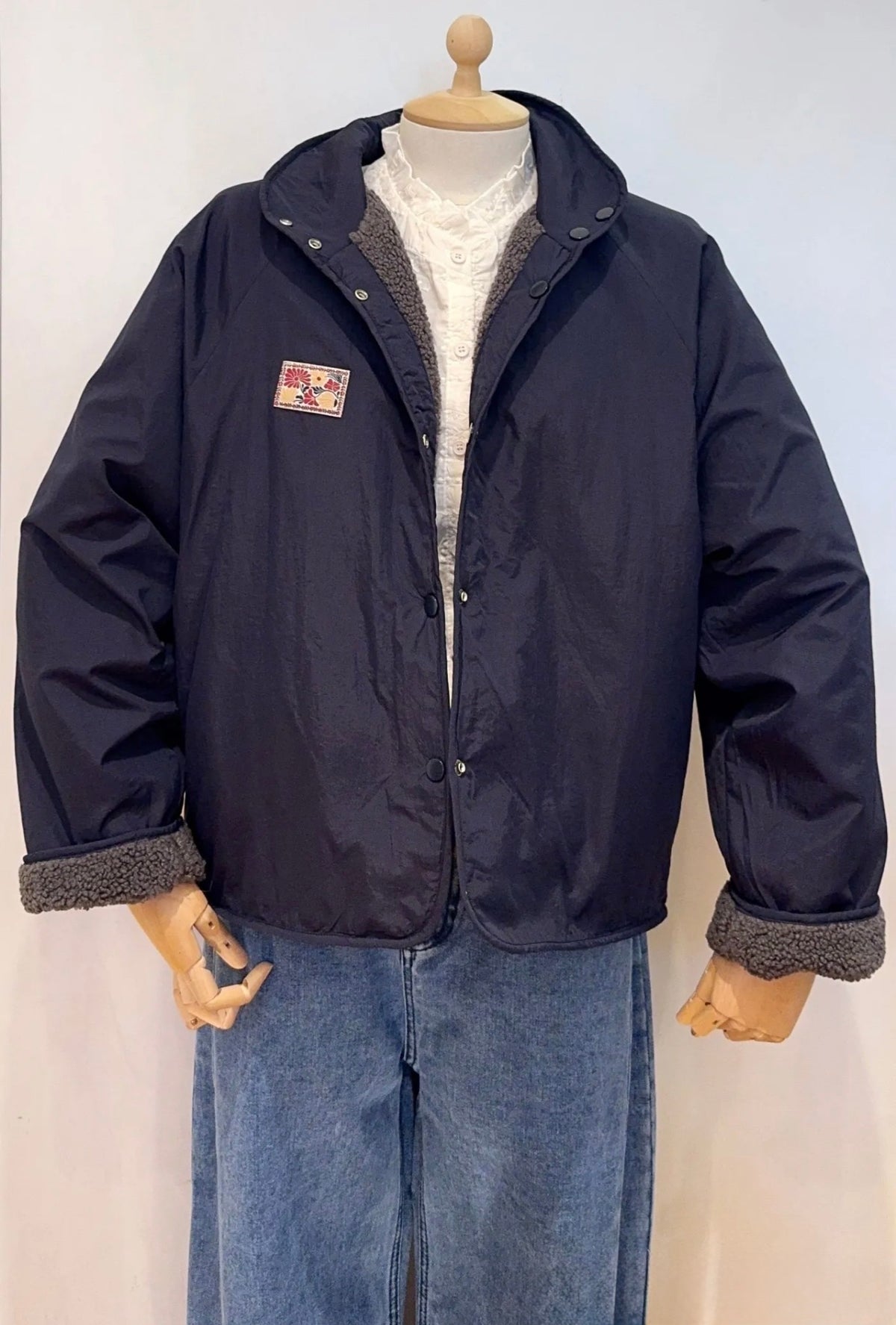 Veste matelassée réversible Sherpa AMÉLIE Bleu marine / Gris